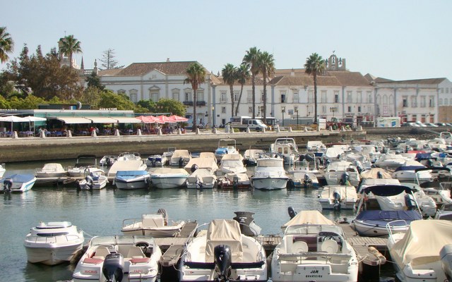 Boats and waterfront buildings at Faro marina, Portugal