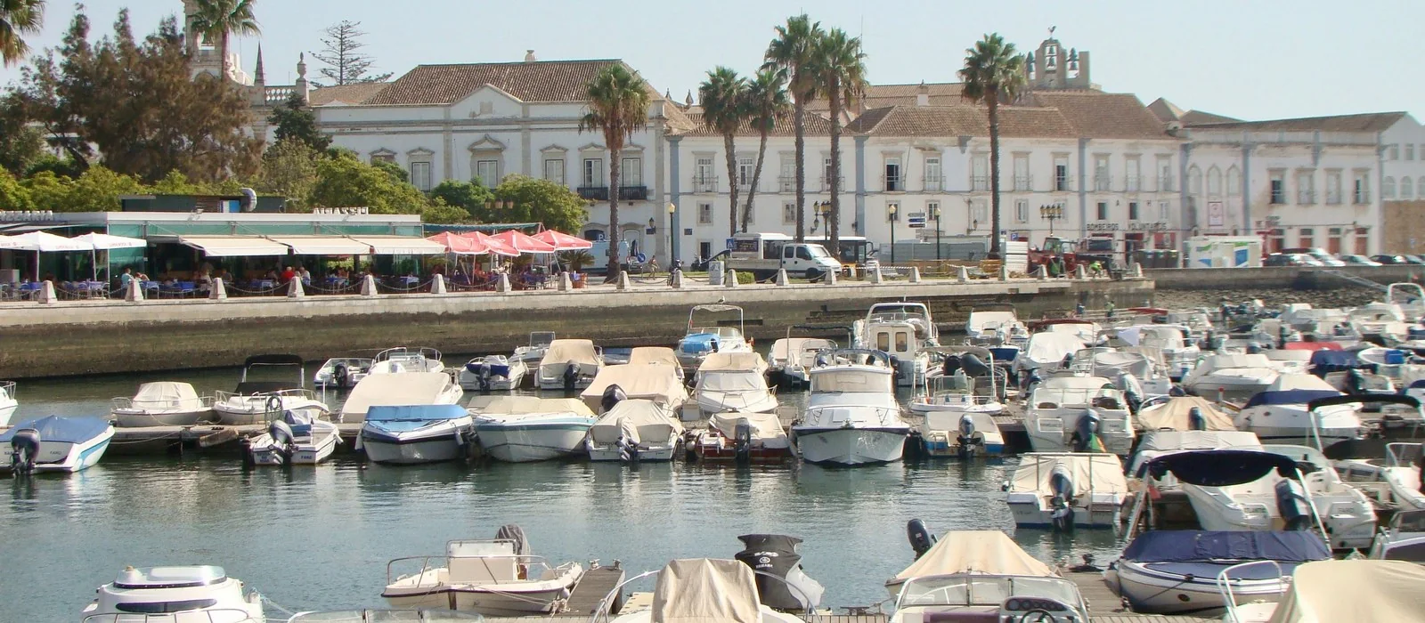 Boats and waterfront buildings at Faro marina, Portugal